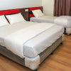 Отель OYO 90027 Happy Hotel, фото 6
