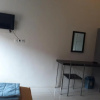 Отель OYO 91162 Homestay Ansyariah Syariah, фото 7