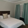 Отель Justin's Place Lounge. An Exceptional Home with no Load Shedding, by The Grove Mall and Wilgers Hosp, фото 20