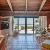 Отель Beachfront With Large Deck Pool Sea Dunes Sailfish A2, фото 10