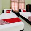 Отель OYO 92001 Unram Guest House, фото 4
