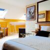 Отель Brit Hotel Le Bosquet в По