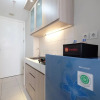 Отель Cozy Studio at The Springlake Apt near Summarecon Mall, фото 5