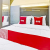 Отель OYO 90737 Losmen Aini Syariah, фото 6