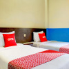 Отель OYO 90162 Remboelan Guest House, фото 8