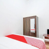 Отель OYO 92946 Dekna Homestay Syariah, фото 15