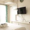 Отель Homey Studio Room at Tamansari Panoramic Apartment, фото 4