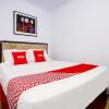 Отель OYO 90237 Ar 20 Guest House Syariah, фото 21