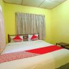 Отель OYO 92503 Penginapan & Villa Sirait, фото 8