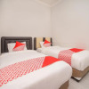 Отель OYO 2937 Nindy Residence 2, фото 7