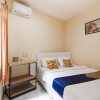 Отель Spot On 3988 Kost Carmelia Baranangsiang Syariah, фото 4
