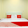 Отель OYO 90978 Khalifi Guesthouse Syariah, фото 7