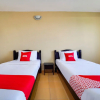 Отель Oyo 44058 Motel Sre Bayam, фото 12