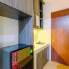 Отель Homey And Tidy Studio At Gunung Putri Square Apartment, фото 2