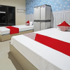Отель OYO 91202 Family Guest House Syariah, фото 5