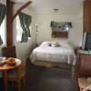 Отель Aloha Crater Lodge and Lava Tube, фото 12
