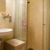 Отель Adelle Apartments, фото 6