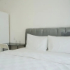 Отель Warm And Cozy Studio Room At Sky House Bsd Apartment, фото 1