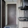 Отель Modern And Homey Studio At Bintaro Icon Apartment, фото 10