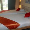 Отель The Oasis Kuta by OYO Rooms в Куте