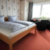 Отель Kleine-Ferienwohnung-6-Strandnah-und-mit-Meerblick-im-Haus-Seeluft-Duhnen, фото 2