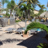 Отель The Flip Flop Sunrise at Coconut Villas - Two Bedroom Condo, фото 1