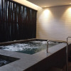 Отель Trendy And Spacious Studio Azalea Suites Apartment, фото 6
