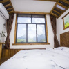 Отель Zhangjiajie Guyong Inn, фото 4