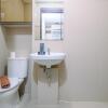 Отель Warm And Minimalist Studio Room Transpark Cibubur Apartment, фото 11