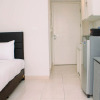 Отель Modern Look And Homey Studio Apartment At Springlake Summarecon Bekasi, фото 6