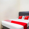 Отель OYO 90785 Mutiara Guest House, фото 19