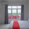 Отель RedDoorz near De La Salle Manado, фото 22