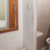 Отель RedDoorz near Pantai Pandan Sibolga 2, фото 12