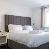 Отель Suites by Rehoboth - Abbey Wood Station - London Zone 4, фото 4