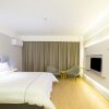 Отель Magnotel Hotel –South Railway Station, Huizhou, фото 4