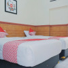 Отель OYO 1190 Griya Soeratin Residence Syariah, фото 12