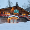 Отель Cottam's Lodge by Alpine Village Suites, фото 1