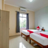 Отель SUPER OYO 90905 Dangau Datuk Guesthouse, фото 3