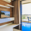 Отель LAGO Condominium, фото 6