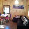 Отель A Holiday Home with a View of Wilkasy Lake. Living Room, 2 Bedrooms, Barbecue, фото 2