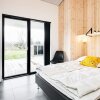 Отель 10 Person Holiday Home in Lokken, фото 14