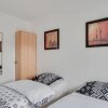 Отель Chic apart with parking near Paris в Обервилье