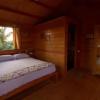 Отель Pele's Windsong Wood Cottage on the beach, фото 3