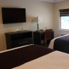 Отель Curtis Inn & Suites, фото 4