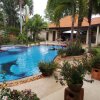 Отель Relaxing Palm Pool Villa, Tropical Illuminated Garden Private Swimming Pool, фото 7