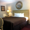 Отель Scottish Inns and Suites, фото 3