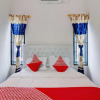 Отель OYO 92861 Raya Guest House Syariah, фото 13