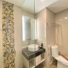 Отель Modern and Spacious Studio Room at Green Kosambi Apartment, фото 8