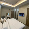 Отель God's Touch Apartments, фото 8