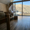 Отель Kazbegi Cottages Qabarjina, фото 1